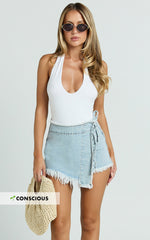 Ellyza Skort - Recycled Cotton Frayed Edge Wrap Denim Skort in Mid Blue Wash