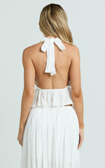Heidi Top - Deep V Halter Neck Tie Brooch Detail Pleated Peplum Top in White