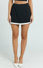 Makenzie Mini Skirt - Contrast Pleat Hem Straight Skirt in Black