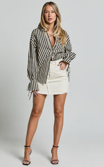 Pieta Mini Skirt - Recycled Cotton Raw Hem Denim Skirt in Ecru