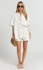 Rhianna Shorts - Mid Waist Recycled Denim Shorts in Ecru with Contrast Tobacco Stitch