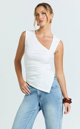 Sullivan Top - Sleeveless Asymmetrical Cut Out Top in Cream