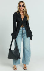 Ada Jeans - Mid Waisted Recycled Denim Barrel Jeans in Mid Blue Wash