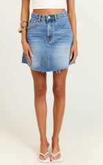 Adan Mini Skirt - Recycled Cotton Frayed Hem Denim Skirt in Mid Blue Wash