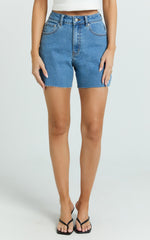Jacqui Shorts - Mid Rise Frayed Hem Denim Shorts in Light Mid Blue