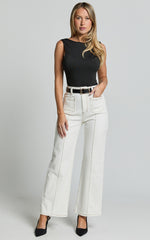 Malcolm Jeans - Mid Rise Contrast Stitch Flared Denim Jeans in White Denim