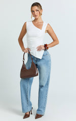 Sullivan Top - Sleeveless Asymmetrical Cut Out Top in Cream